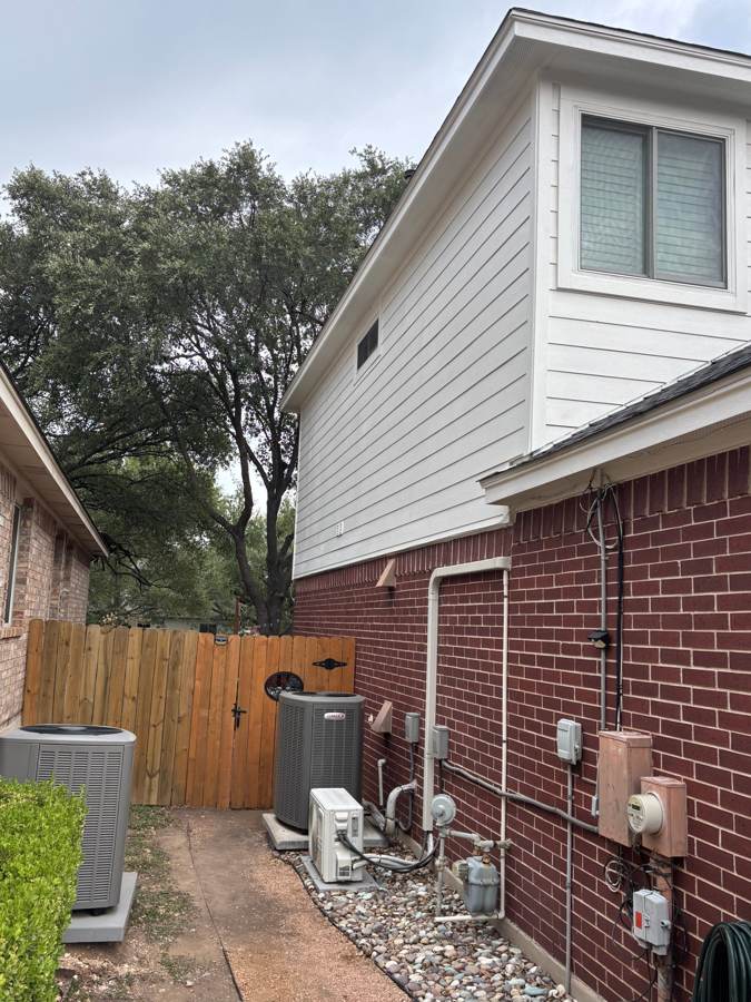 New lap siding and soffit on the same wall